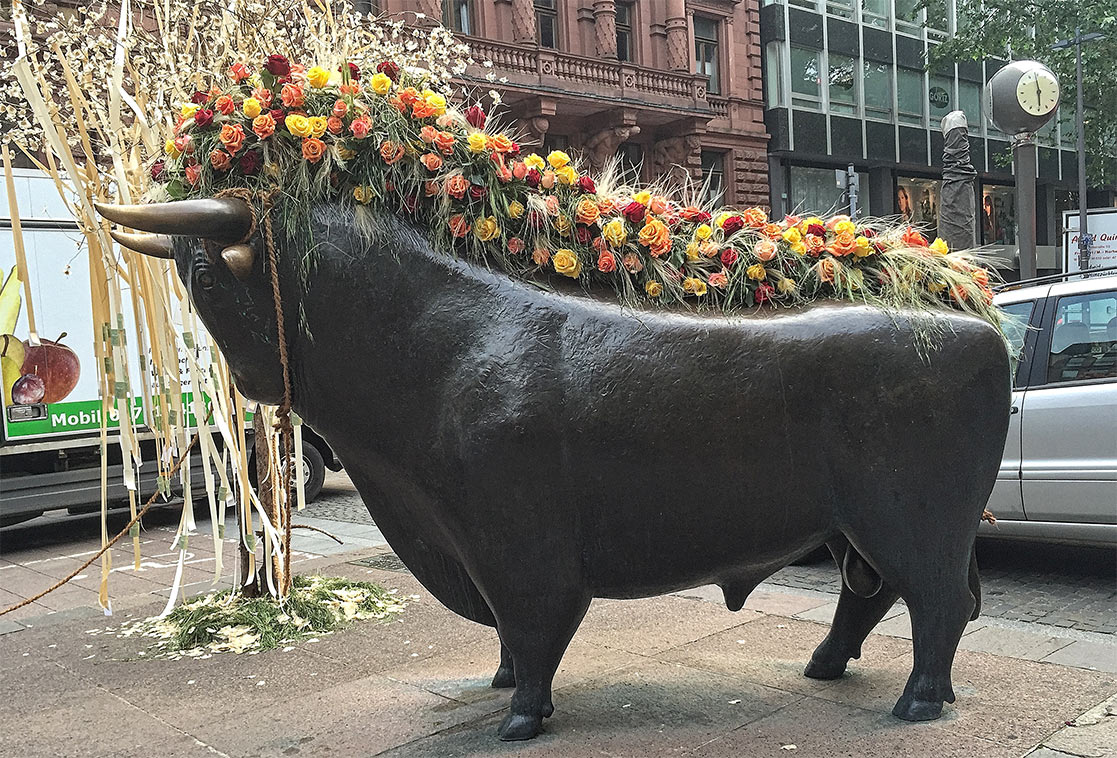 Stock Exchange bull with a mane of roses